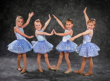 Tap dancers in recital costumes
